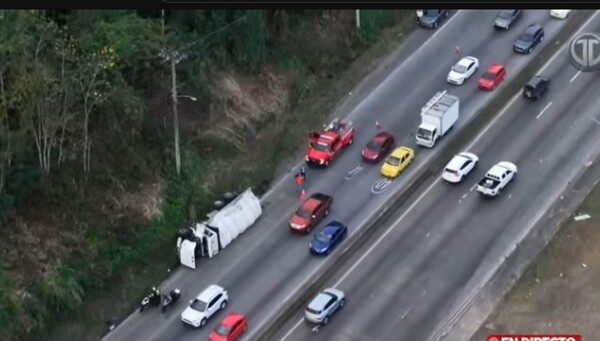 Cement truck overturns causing traffic jam